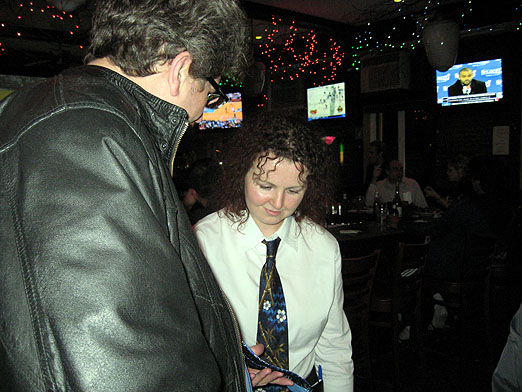 Dan and Dierdre comparing ties.