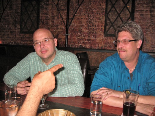 David makes a point to Robert and Daniel